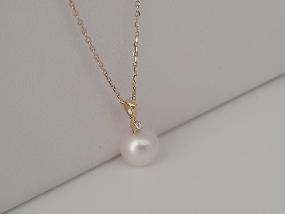 Hangerketting van een witte Zuidzeeparel AAA, diamant en 18K geel goud