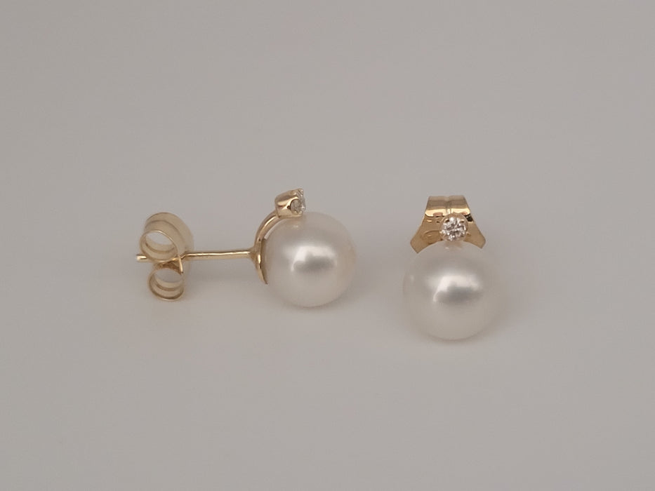 Oorknopjes Witte Zuidzeeparels, diamanten, 18K geel massief goud
