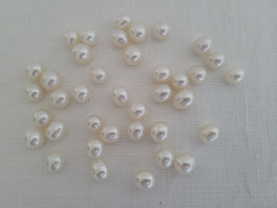 Wholesale Lot White South Sea Pearls 10-11 mm, 39 pcs of Very High Luster - Only at  The South Sea Pearl